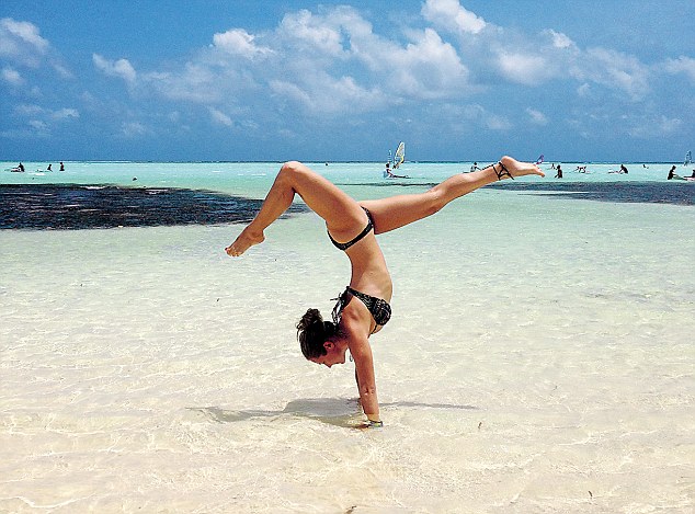 Hand Stand on the Beach